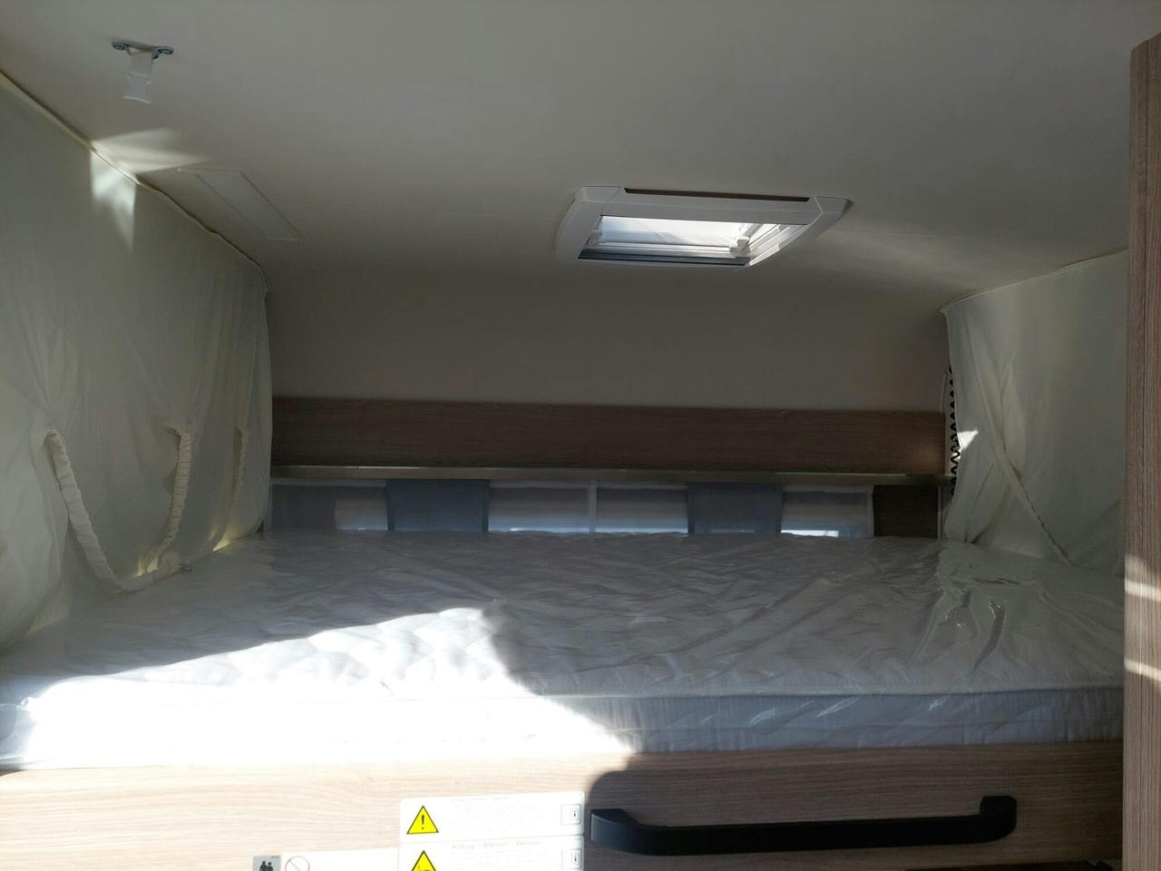 Espace couchage de la Bürstner Premio Plus 510 TK